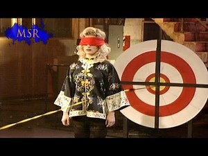 MAGICIAN FIRES ARROW THROUGH ASSISTANT'S STOMACH!