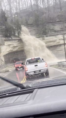 ‘This Is Scary’: Indiana Waterfall Surges Onto Road After Heavy Rains
