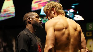 Logan Paul and Floyd Mayweather Square Off in Crazy, Pre-Fight Weigh-in