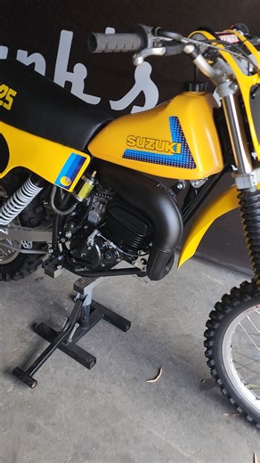 Franks Garage Melbourne on Instagram: "The 1979 RM125. Suzuki Race Machine. Lightweight, air-cooled two-stroke from a time when motocross was all man and machine. Suzuki’s power reed system gave these bikes a real edge, improving throttle response down low while still letting them pull hard up top. For the late ’70s, that was seriously advanced tech. No electronics, no rider aids. Just a sharp powerband, clutch control, and a bike that rewarded skilled riding. Raw, simple, and incredibly fun. #f