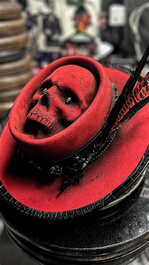 Custom-made carved skull crown in dark red