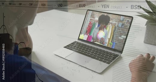 Viewer leaning in sparking finance charts over laptop, seller showing wheel and swatch for retail