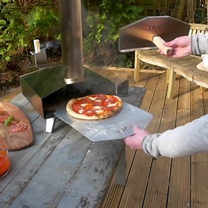 You can make pizza anywhere with this portable mini-oven. | Insider Tech
