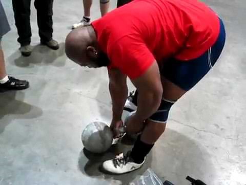 Mark Felix attempts the Millennium Dumbbell