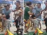 Woman SLAPS boy across the face during argument with his dad