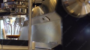 Barista making perfect shot coffee with coffee maker machine, business time with coffee, selective focus and free space for text, Industrial food&drink and Lifestyle concept.