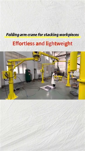 Knuckle boom crane for stacking workpieces