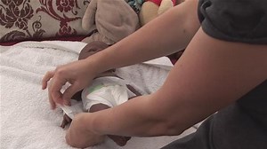 How To Put On A Diaper