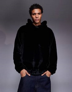 ASOS DESIGN relaxed faux fur hoodie with side entry pockets in black | ASOS