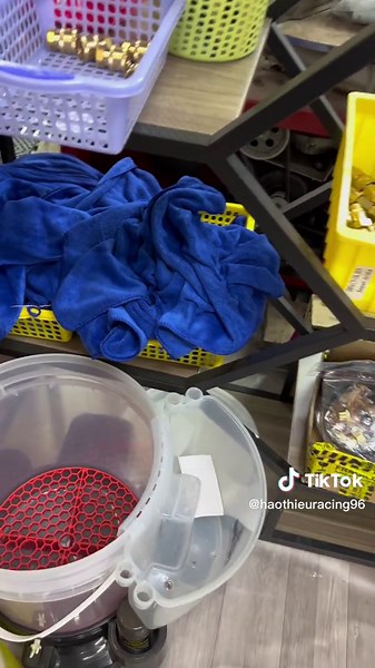 Blue Towel Folding in Domestic Setting Video