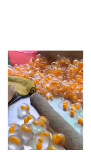 TechopediaX on Instagram: "Slime eggs are created by mixing a base of clear or white glue with water and a slime activator like borax solution, contact-lens solution, or liquid starch until the mixture thickens into a stretchy slime. To make them look like “eggs,” the finished slime is rolled into small oval shapes or placed into tiny plastic capsules, often with added glitter, beads, or color for effect. The process is simple, requires no heating, and relies on a chemical reaction between the g