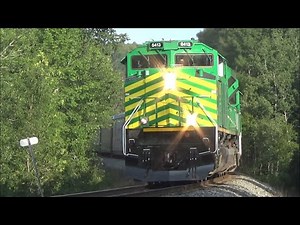 Three Big Green SD70M-2s Lead a Long Stack Train NBSR 120 pass Sagwa, NB