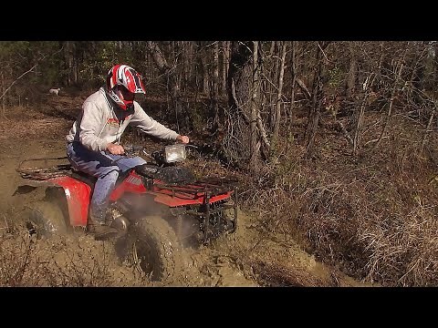 Thrashing a 1985 Honda TRX250 FourTrax!! | Mudding, Drifting, Creek Crossing’s, Fly-By's & More!