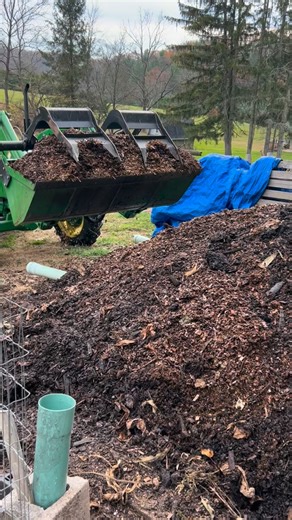 Having a compost pad is an important aspect to this operation. Not everything is edible by larvae and there is a fair amount of residue post bioconversion process that still requires proper management. #asp #compost #compostPad #johnDeere #loader #woodChips #carbon #nitrogen #soilAmendments #feedYourFutureSelf #fullCircle #bionconversion | Full Circle Bioconversion LLC