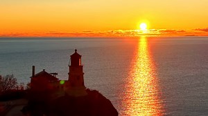 13 reactions | I caught Split Rock Lighthouse waking up with the sun last week when I was in Duluth. The drone picked up every bit of that golden glow and the fall colors were still hanging on strong. My favorite part is the boat at the end. ✨” | Loans & Drones | Facebook