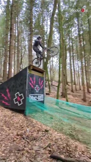 Outdoor Sports: Biker's Wild Slide After Jump Mishap || WooGlobe