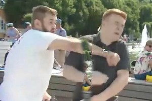 Reporter gets punched in the face during live broadcast