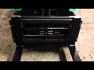 Forklift truck fork positioner