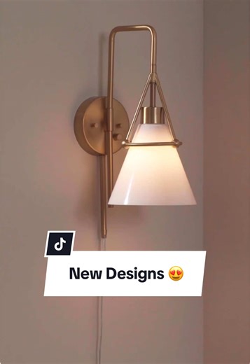 New designs are here 💡 Find the latest and greatest in chandeliers, ceiling fans, wall sconces, and so much more. #myLampsPlus Featured: Finn Gold & Black Chandelier- Style 2208D Verdin Brass & Black Damp Ceiling Fan- Style 2600H Brynn Cone Shade & Brass Lamp- Style 4682F Casmere Gold Plug-In Wall Sconce- Style 9228F Noma Warm Gold Bath Light- Style 9816E