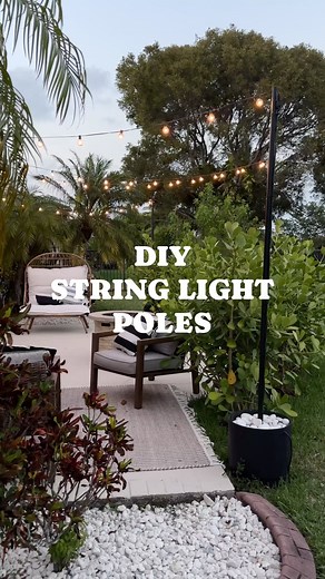 Carol & Ale on Instagram: "How to make a decorative string light poles! A quick and easy DIY for those that want string lights but don’t have anywhere to hang them. Our backyard doesn’t have a fence or trees around to hang our lights so we needed to come up with an alternative solution. For 3 poles, it took us about 1 hour total to lay down concrete, position pole and let it dry. You’ll have to wait between 16-20 hours for concrete to set and work on the next steps. Then, just spray paint it bla