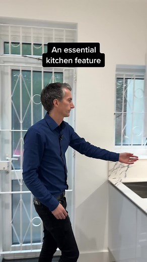 Make the top of your wall units completely accessible with this pull down spice storage. #kitchendesign #interiors #modernkitchen #decor #kitcheninspo