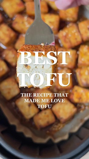 this is my go-to airfryer tofu recipe, complete with a simple sauce that's a lil spicy, a lil sweet 🔥 if you don't have an airfryer, just bake at the same temps and times (but i do recommend airfryer for this!!) ingredients: • 1 lb block of tofu, pressed for 30 min and cubed • 1 tbsp tapioca, arrowroot, or corn starch • 1 tbsp coconut aminos or soy sauce • 1 tsp salt 1/2 tsp black pepper • 1 tsp garlic powder • 1 tsp smoked paprika • 1 tsp ground ginger • 1/2 tsp onion powder • 1 tbsp olive or 