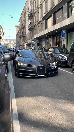 Luxury Cars Displayed on City Streets