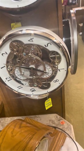 Small world rhythm chronograph clock