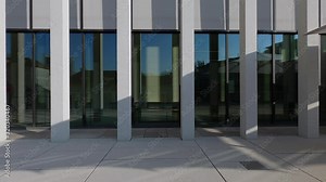 James Simon Galerie, Museumsinsel Berlin, detail of facade and colonnades with some visitors behind the glass