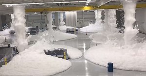 Helicopter hangar filled with fire-fighting foam as part of test simulation (Video)