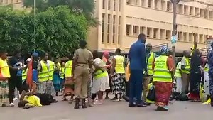 Police disperse Kampala city cleaners and other casual workers who stormed Parliament protesting KCCA 's delayed payment of their salaries and wages for over four months. Some of the protestors were seen fainting in scuffle that ensued. #MonitorUpdates 🎥 Peter Sserugo | Daily Monitor