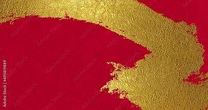 Animation of golden patterns gradually being drawn on red Japanese paper