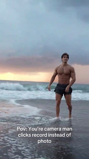 Muscular Man Running on Beach: Captured Moments
