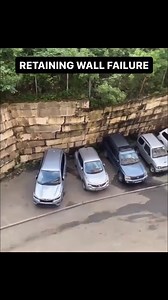 Retaining wall failure. — Failure like this can happen in various ways: foundation issues, improper design, improper construction, improper backfill, and/or improper drainage. — Lack of drainage behind walls like this can lead to water building pressure behind them, leading to spectacular failures like this one! | Aaron Witt