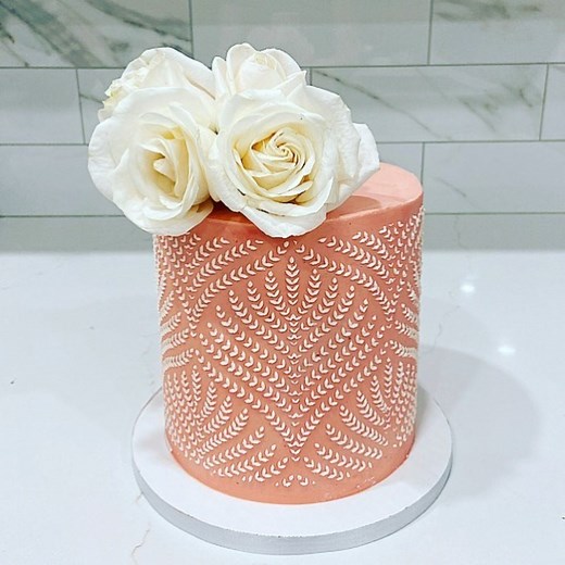 Learn how to use a stencil on a cake with buttercream! By: Sugarella Sweets | MetDaan Cakes