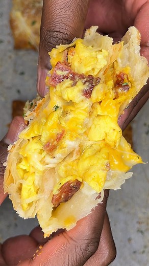 477K views · 852 reactions | Breakfast Hot Pocket | kingcooks Layers of golden pastry cradle a symphony of cheesy eggs, crispy bacon and an unforgettable cheese pull. Comment “recipe” if you’d like to add this one to your collection! #instagood #breakfast #baconeggandcheese #easyrecipes | Kingcooks | Facebook