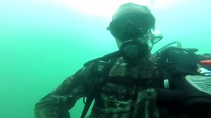 Oscar Perez demonstrates how a firearm works underwater