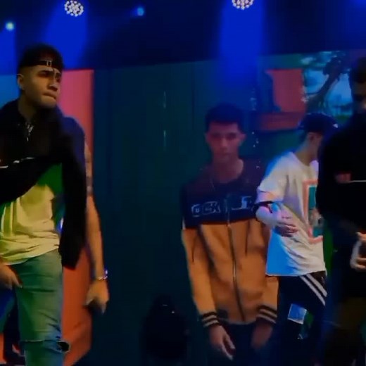 Live Performance: Young Men Singing and Rapping on Stage