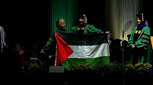 Graduating student unveils Palestinian flag at first USF commencement ceremony