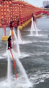 Now THAT'S a water show! 💦✨ Performers dancing ON WATER with jetpacks—it's like a scene from a sci-fi movie! #WaterJetpack #Tech #Art #AmazingShow #China | iChongqing