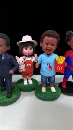 Cute Handmade Clay Bobbleheads Shaking Together