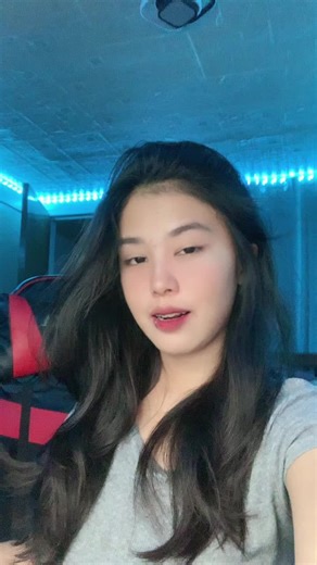 Gaming Room Setup with LED Lights and Chair