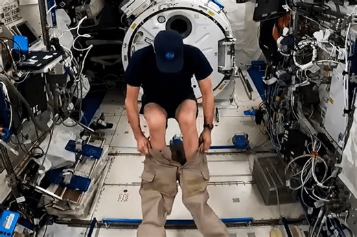 Astronaut on the ISS shows how he puts his pants on in zero gravity