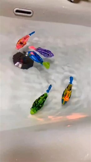 Nio Pets | **🐟🌊 Dive Into Fun with the Swimming Fish Cat Toy!** Watch your cat go wild for this **realistic swimming fish toy** – it splashes,... | Instagram