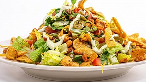 Rach's beef taco salad with Fritos Corn Nuts = the crunchy taco salad of our dreams. FULL RECIPE > https://rach.tv/31smzCT | Rachael Ray Show