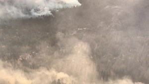 A view above Christmas valley from Highway 50 fire surrounding S. Upper Truckee Road. ￼￼ | John Bartell