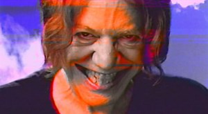 Danny Elfman Releases VHS Style Music Video for Boy Harsher Remix of “Happy” [Video]