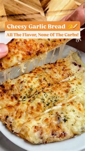 Cheesy Garlic Bread 🧀🥖 Crispy, buttery, and loaded with melted cheese—this low-carb version is ready in under 10 minutes and tastes just as good as the real thing. 😋 🚨 Full recipe with tips, variations, and nutrition info: ➡️ https://keto.recipes/air-fryer-cheesy-garlic-bread-quick-easy-low-carb/ 💬 Would you try this? Drop a 🧀 below! Don't forget to SAVE and SHARE this easy #snack #recipe! 📸: @ketosnackz | Keto Recipes