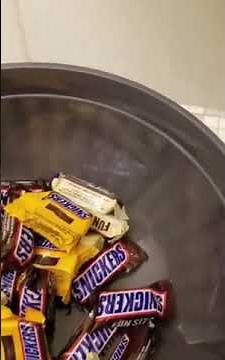Guy Offers Candies to Other Guys From Under Toilet Stall During Halloween