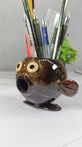 Here you go, Bonny 😊 A clean and attractive Facebook photo/video post title & description for your craft: --- Title: 🐟 Coconut Shell Fish Model Pen Holder | Handmade Eco-Friendly Craft Description: Beautifully handmade fish model pen holder crafted using natural coconut shell 🌴🐟 This unique eco-friendly desk organizer is perfect for holding pens, pencils, and small stationery items. A creative way to reuse coconut shells and add a touch of nature to your workspace or home décor. ✨ 100% Handm